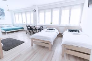 Posteľ alebo postele v izbe v ubytovaní The Dots Hostel