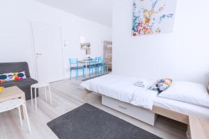 Posteľ alebo postele v izbe v ubytovaní The Dots Hostel