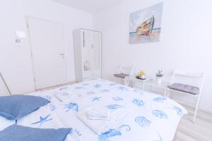 Posteľ alebo postele v izbe v ubytovaní The Dots Hostel
