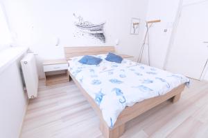 Posteľ alebo postele v izbe v ubytovaní The Dots Hostel