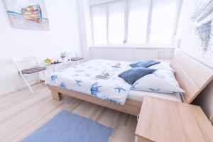 Posteľ alebo postele v izbe v ubytovaní The Dots Hostel