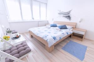 Posteľ alebo postele v izbe v ubytovaní The Dots Hostel