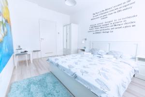 Posteľ alebo postele v izbe v ubytovaní The Dots Hostel