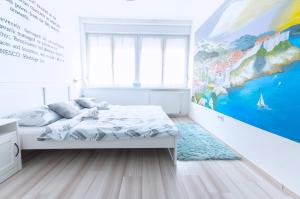 Posteľ alebo postele v izbe v ubytovaní The Dots Hostel