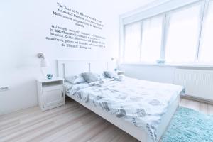 Posteľ alebo postele v izbe v ubytovaní The Dots Hostel