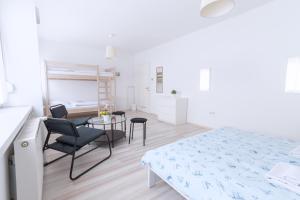 Posteľ alebo postele v izbe v ubytovaní The Dots Hostel