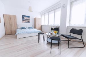 Posteľ alebo postele v izbe v ubytovaní The Dots Hostel