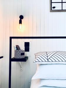 Llit o llits en una habitació de Hôtel Gaspard