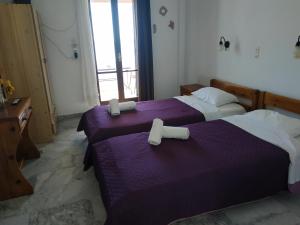 Una cama o camas en una habitación de Παραθαλασσια στουντιο Μιχαλιας Sea view studio Michalias