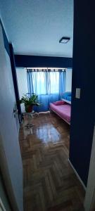 Excelente DPTO a cuadras del mar客房内的一张或多张床位