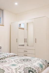 Łóżko lub łóżka w pokoju w obiekcie Apartmani Park Maksimir-Rebro