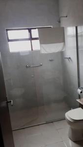 Um banheiro em Verona Parque Hotel