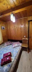 Postel nebo postele na pokoji v ubytování Kotiedzh u Mariny