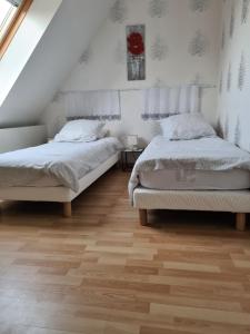 Postel nebo postele na pokoji v ubytování gîte Brocéliande - Closeries du Golfe