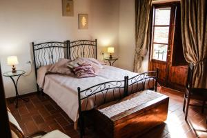 เตียงในห้องที่ Agriturismo Bombina