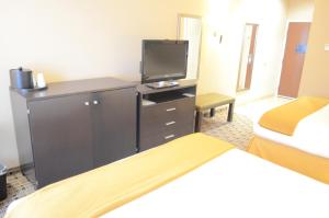 Kuchyň nebo kuchyňský kout v ubytování Aspen Grand Hotel Houston