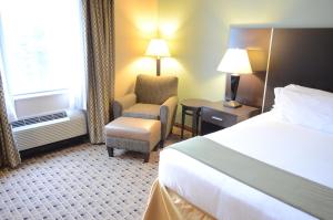 Postel nebo postele na pokoji v ubytování Aspen Grand Hotel Houston