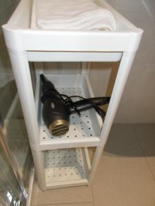 A kitchen or kitchenette at Il Giardino di Anna - Charming rooms in Cagliari