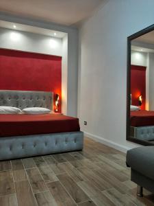 A bed or beds in a room at Appartamento ALECATIA 2