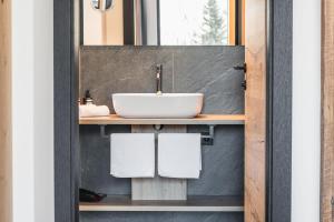 Koupelna v ubytování Hotel Wolf + 29 fotografií