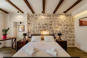 Ένα ή περισσότερα κρεβάτια σε δωμάτιο στο Conte Hotel & Restaurant +227 φωτογραφίες