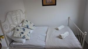 Postel nebo postele na pokoji v ubytování Apartment Krajowej