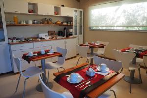 En restaurant eller et andet spisested på Del Nomade Hosteria Ecologica