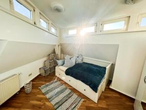 Voodi või voodid majutusasutuse Über den Dächern der Löbervorstadt toas