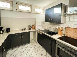 Köök või kööginurk majutusasutuses Über den Dächern der Löbervorstadt +7 fotot