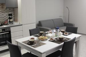 A kitchen or kitchenette at AGAS Exclusive Apartment