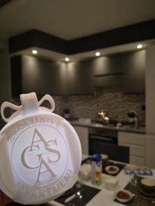a kitchen with a white bag on a counter at AGAS Exclusive Apartment in Catanzaro