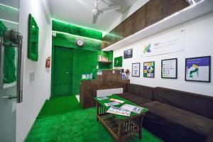 Hotel Green Exotica Mahabaleshwar的休息区