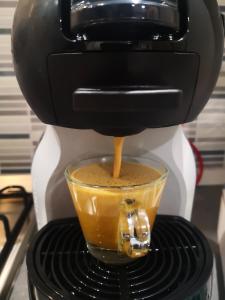 Coffee and tea making facilities at AGAS Exclusive Apartment
