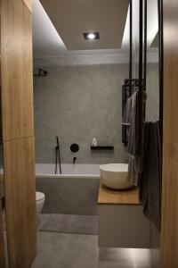 Fotografia z galérie ubytovania Uroczy apartament z widokiem i darmowym parkingiem v Poznani