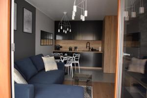 Fotografia z galérie ubytovania Uroczy apartament z widokiem i darmowym parkingiem v Poznani