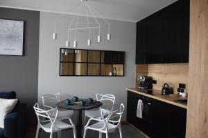 Fotografia z galérie ubytovania Uroczy apartament z widokiem i darmowym parkingiem v Poznani