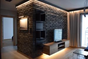 Fotografia z galérie ubytovania Uroczy apartament z widokiem i darmowym parkingiem v Poznani
