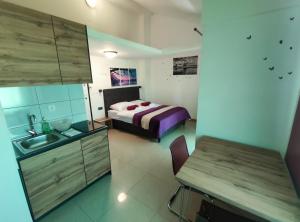 Ένα ή περισσότερα κρεβάτια σε δωμάτιο στο Apartments Pongrac