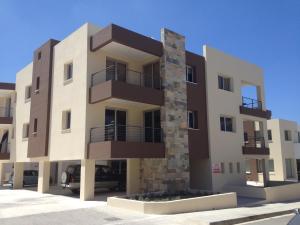 a building with balconies on the side of it at Niro Apartments in Polis Chrysochous