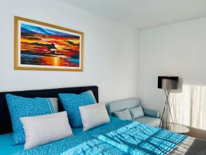 Ein Bett oder Betten in einem Zimmer der Unterkunft Fewo unweit Warnemünde Sobierajczyk in Markgrafenheide
