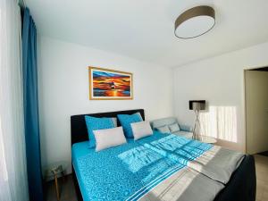 Ein Bett oder Betten in einem Zimmer der Unterkunft Fewo unweit Warnemünde Sobierajczyk in Markgrafenheide