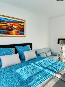 Ein Bett oder Betten in einem Zimmer der Unterkunft Fewo unweit Warnemünde Sobierajczyk in Markgrafenheide