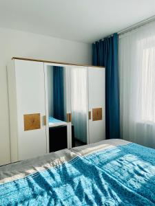 Ein Bett oder Betten in einem Zimmer der Unterkunft Fewo unweit Warnemünde Sobierajczyk in Markgrafenheide