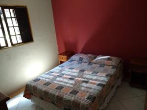 Giường trong phòng chung tại Chalé Boa Vista