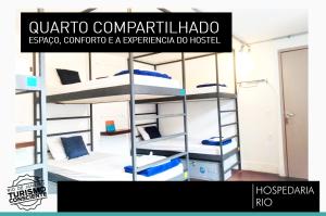 a poster of a dorm room with bunk beds at Hospedaria Rio in Rio de Janeiro