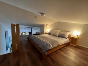Postel nebo postele na pokoji v ubytování Ubytování Zadov - Apartmán Prenet