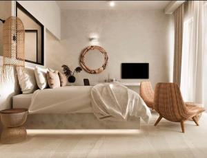 TV a/nebo společenská místnost v ubytování Delfini Beach Hotel & Suites