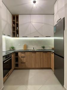 Kuchyň nebo kuchyňský kout v ubytování MonteRelax Apartments Becici