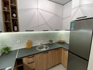 Kuchyň nebo kuchyňský kout v ubytování MonteRelax Apartments Becici