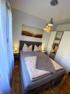Postel nebo postele na pokoji v ubytování MonteRelax Apartments Becici